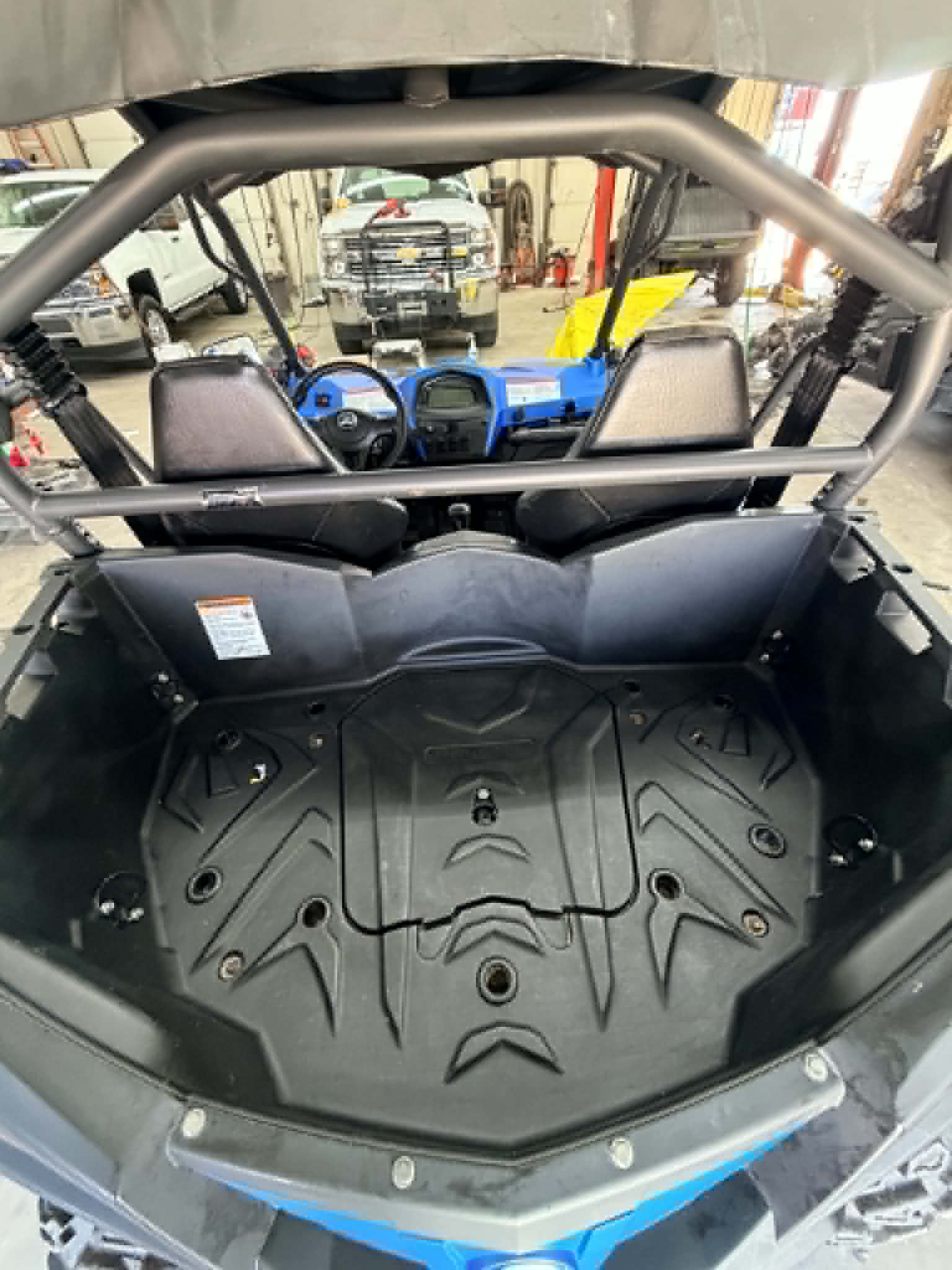 Clean UTV rear cargo bed after detail